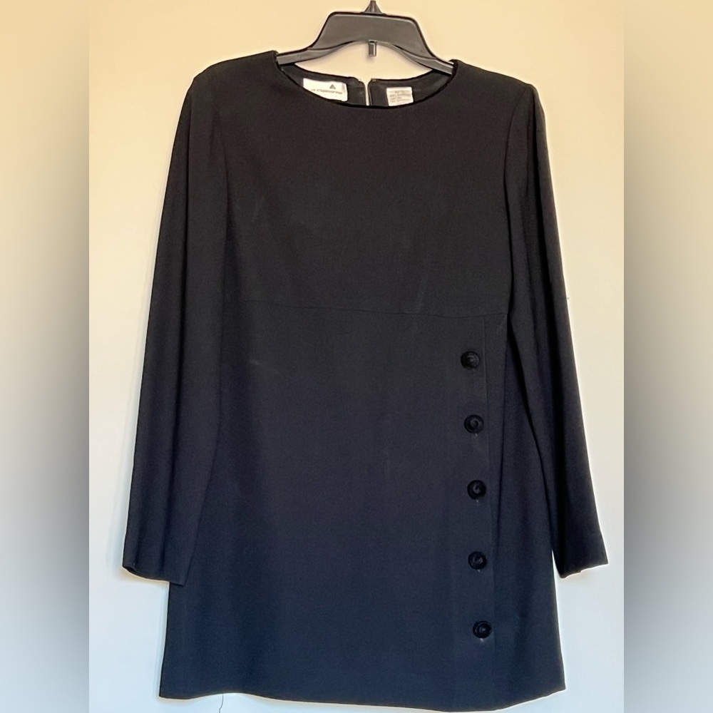 Two pieces, black Liz Claiborne skirt and tunic top. Size 6.